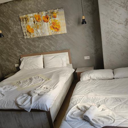 Ajilin Hotel Rooms كورتشي الغرفة الصورة