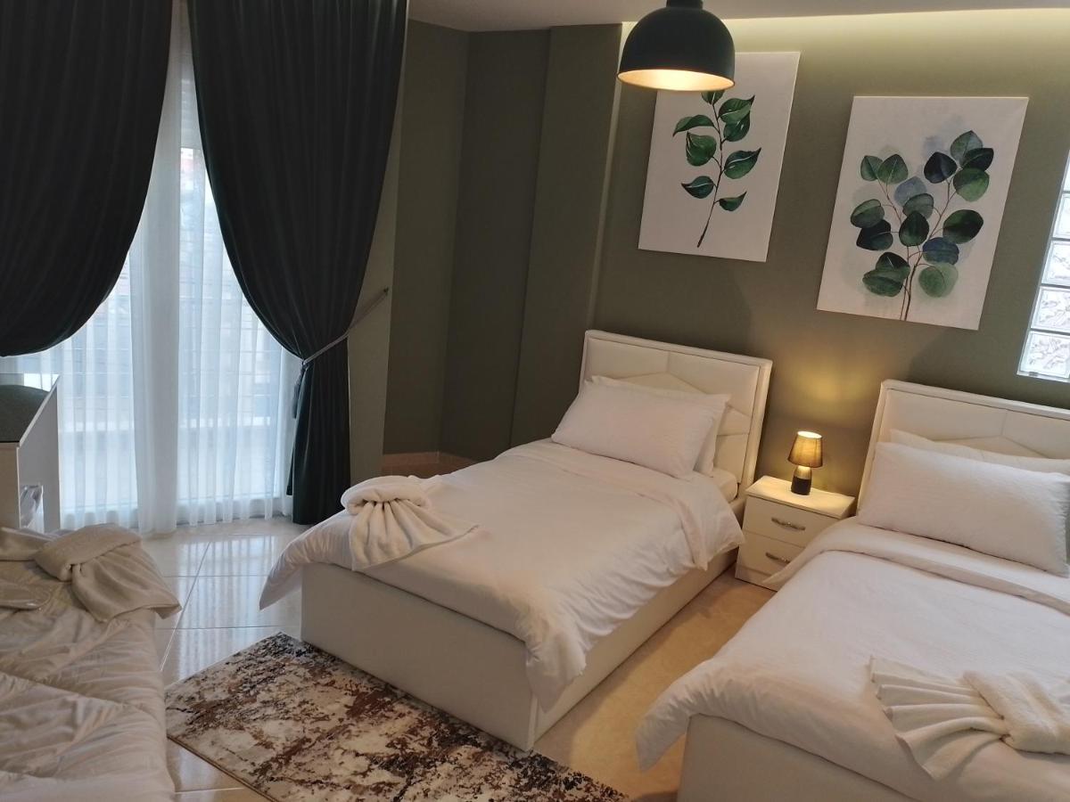 Ajilin Hotel Rooms كورتشي المظهر الخارجي الصورة