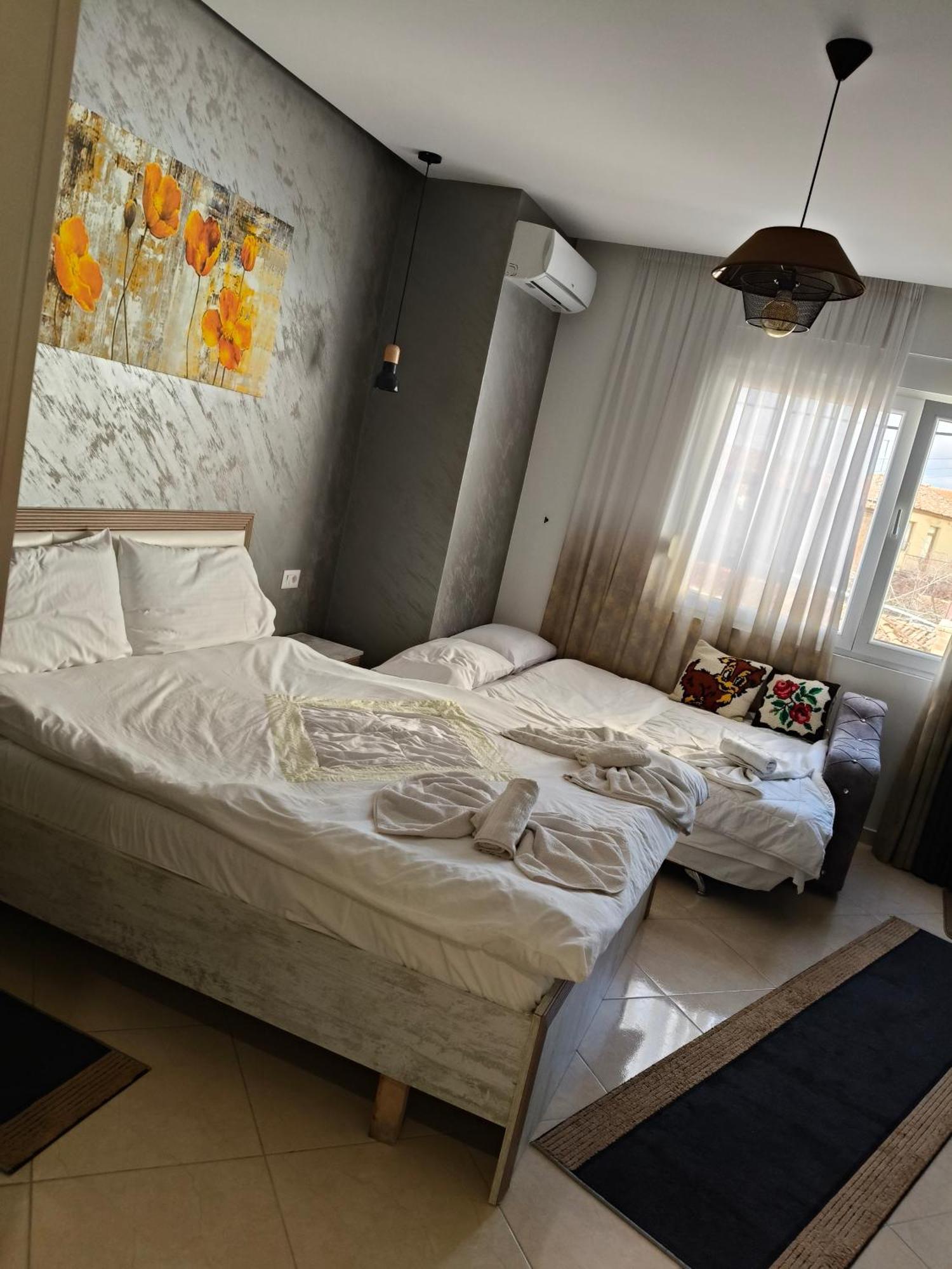 Ajilin Hotel Rooms كورتشي الغرفة الصورة