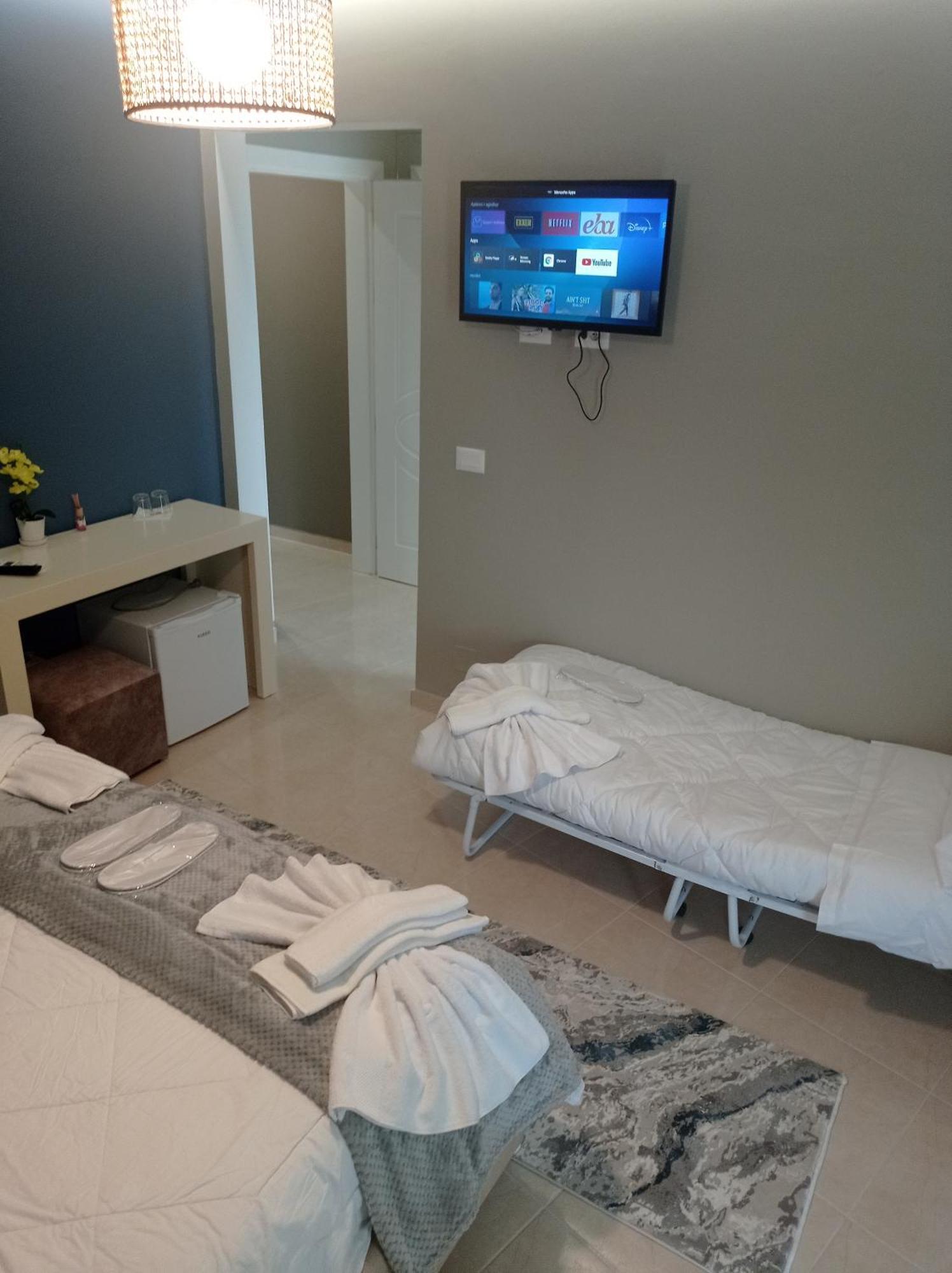 Ajilin Hotel Rooms كورتشي الغرفة الصورة