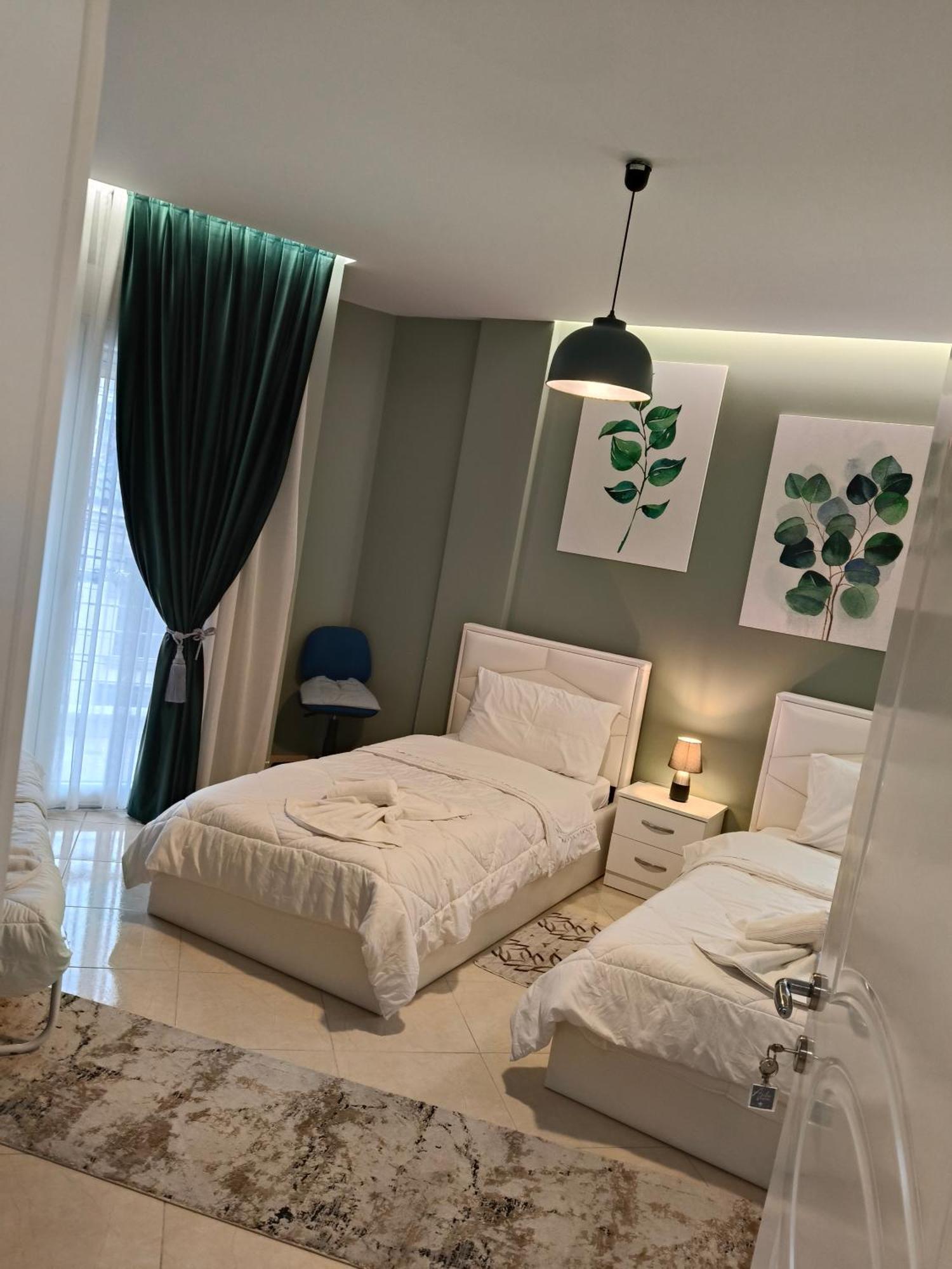 Ajilin Hotel Rooms كورتشي الغرفة الصورة