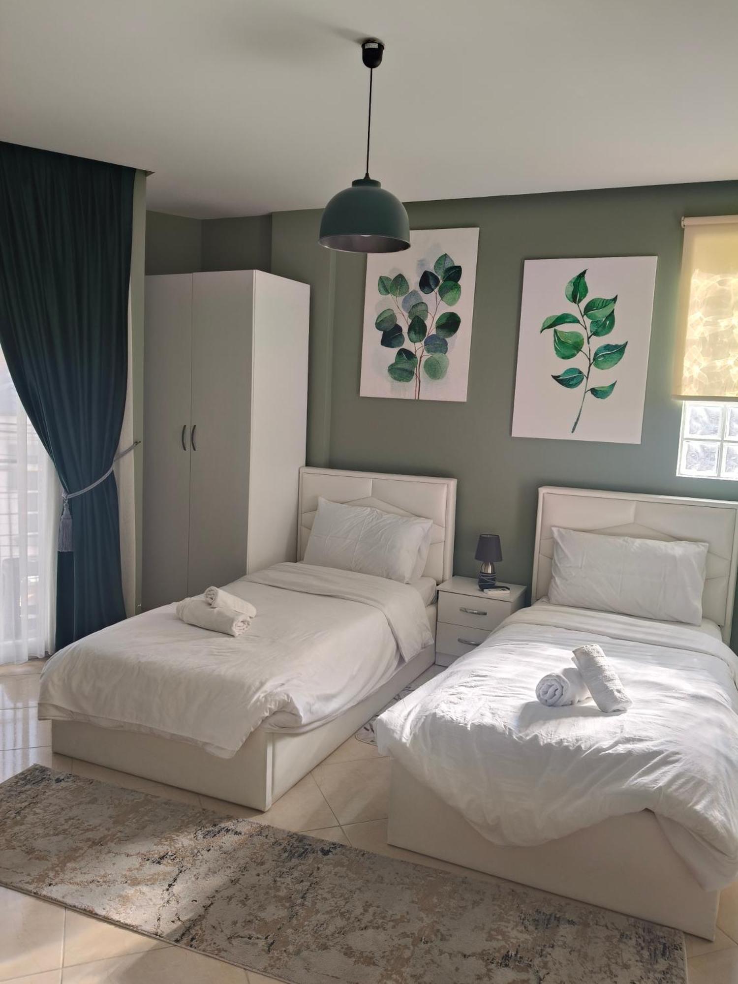 Ajilin Hotel Rooms كورتشي الغرفة الصورة