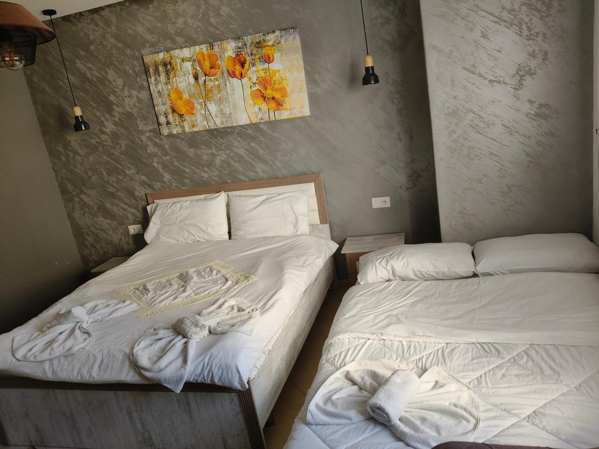 Ajilin Hotel Rooms كورتشي الغرفة الصورة